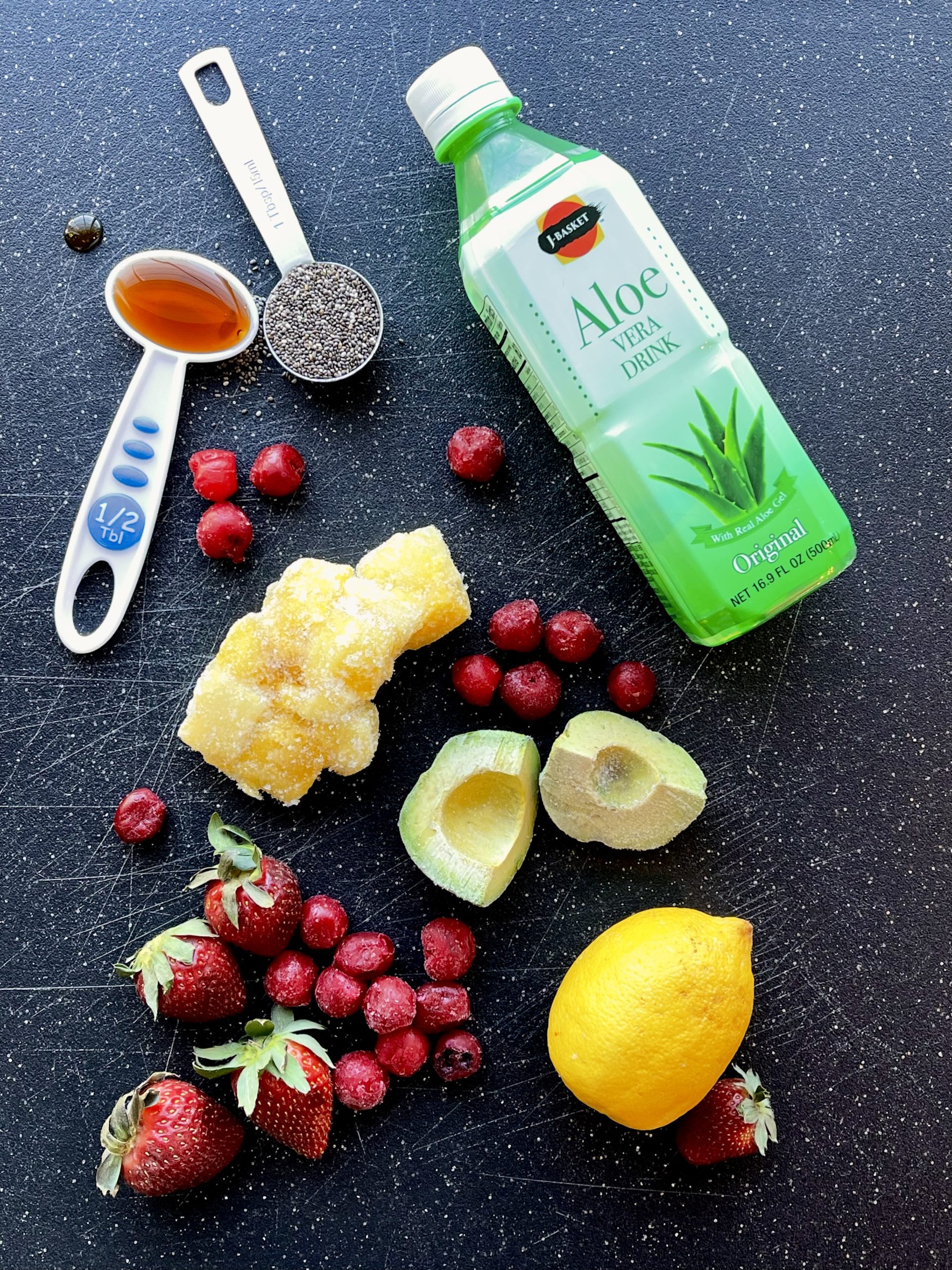 All of the ingredients for strawberry lemonade smoothie | just the recipes, please